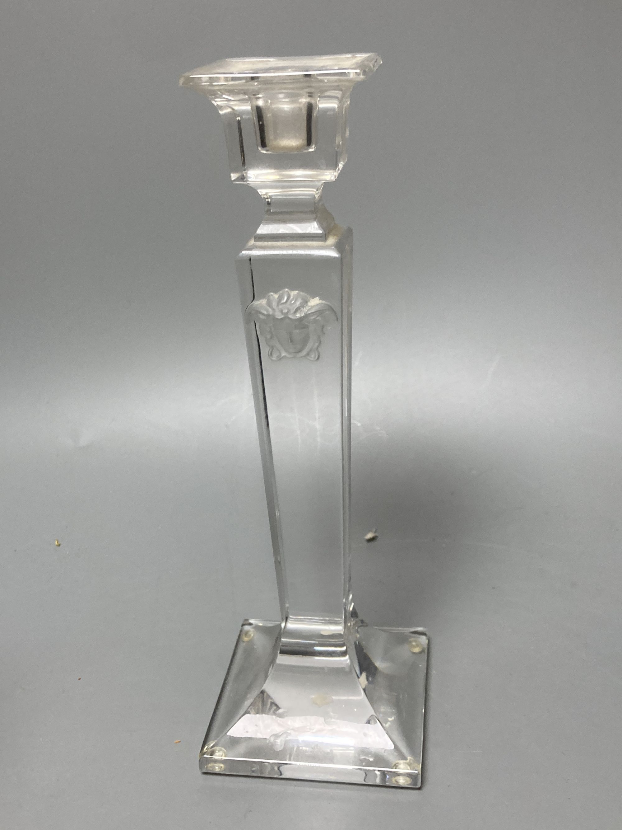 A pair of Tiffany candlesticks and one other (glass)